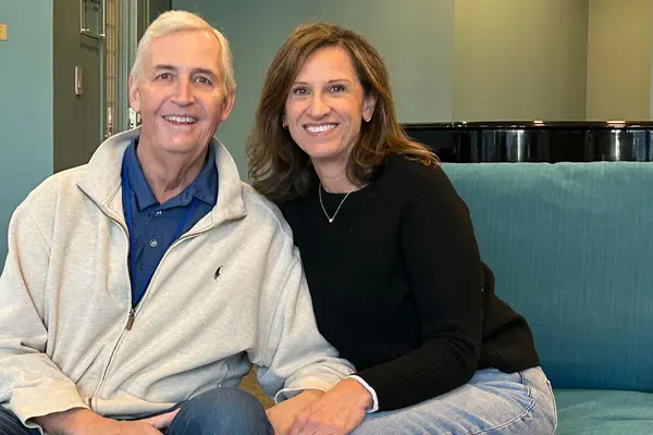 MSK treated Steve Harrold, sitting with his wife, Sara, for throat cancer. 