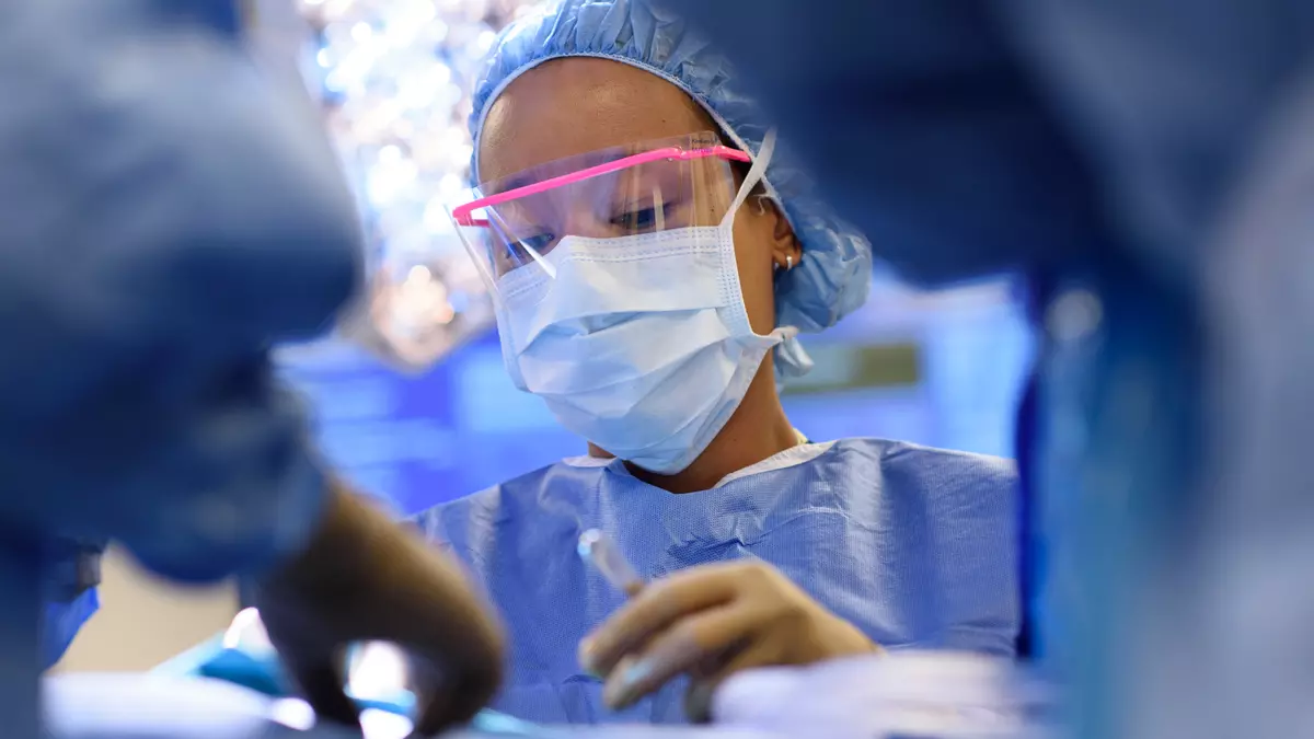 Breast surgeon Tracy-Ann Moo operates on a patient 