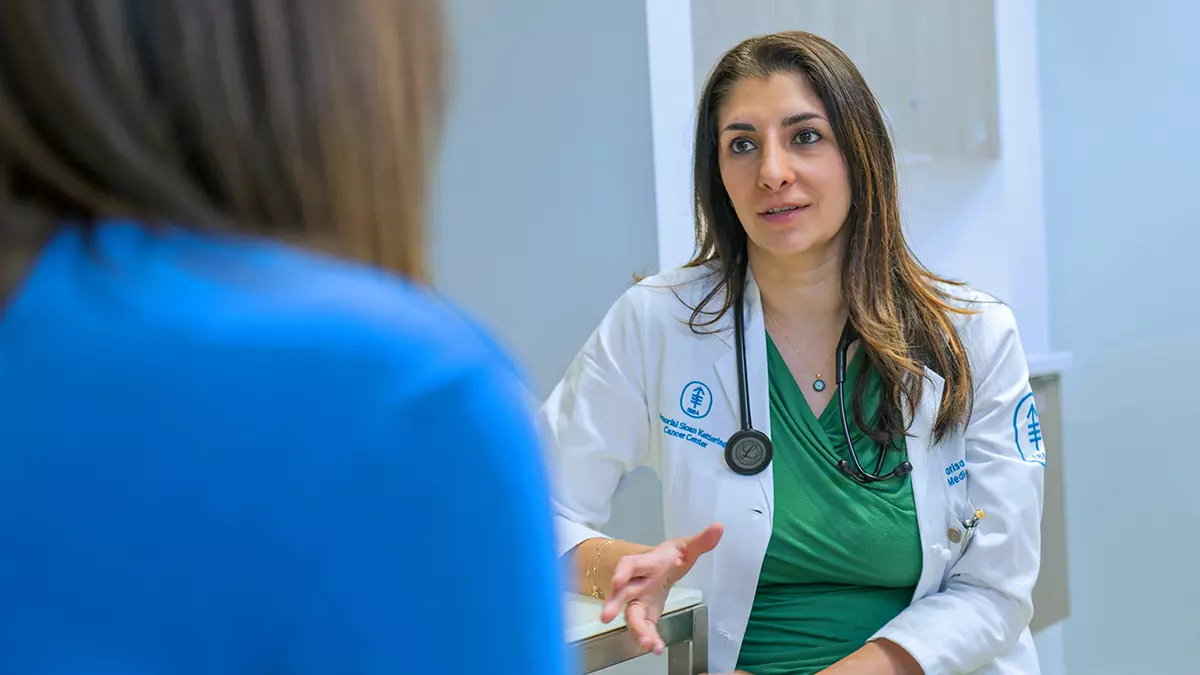 Medical Oncologist Dr. Parissa Momtaz Consults with Patient