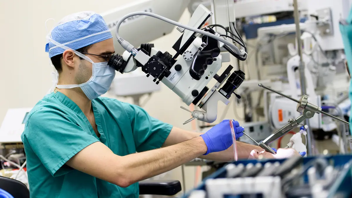Head and neck surgeon Dr. Luc G. T. Morris uses robotic surgery equipment at MSK in New York City. 